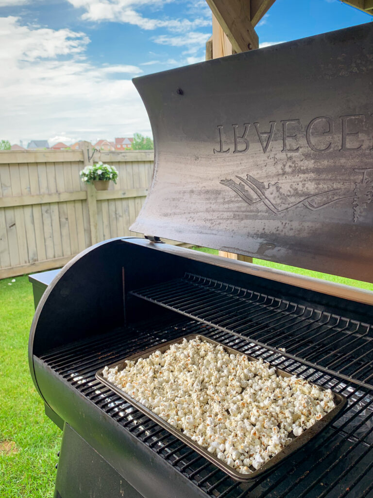 A tray of popcorn on the Traeger smoker.