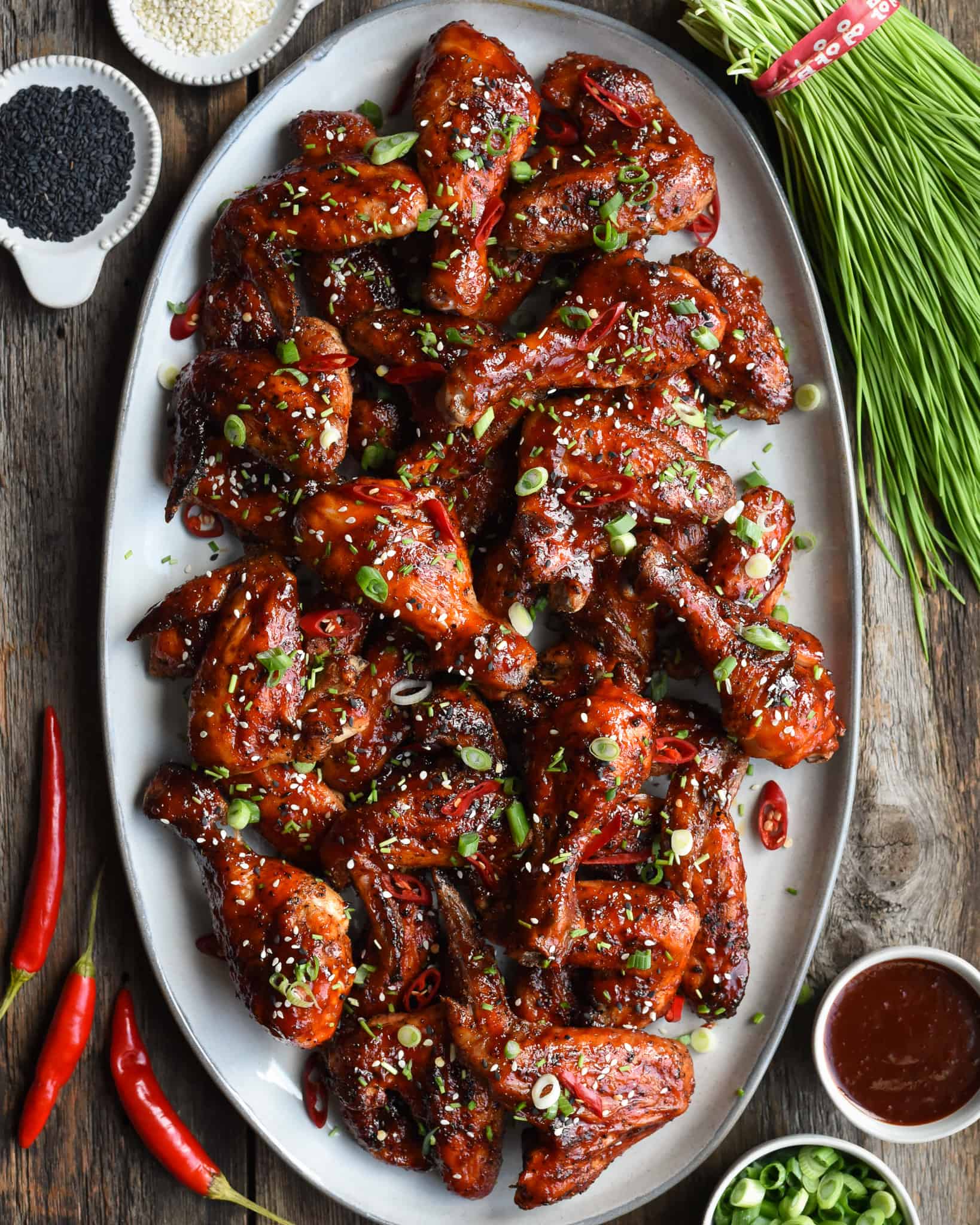 A platter of Grilled Chicken Wings & Drums with a spicy Korean BBQ Sauce
