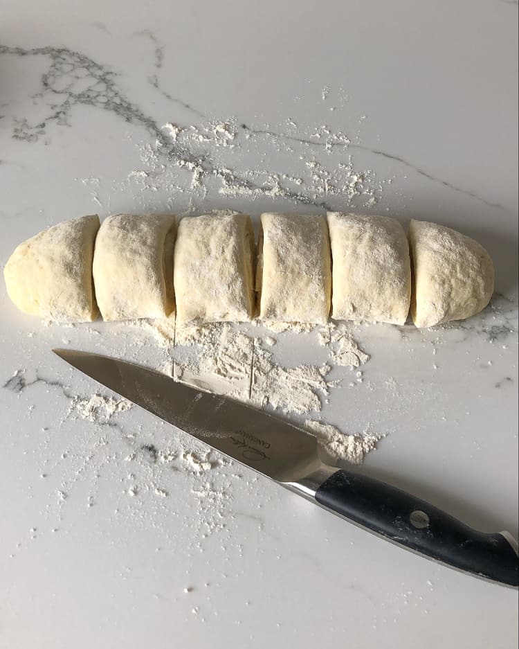Shape the dough into a long rectangle and cut into 6 equal portions,