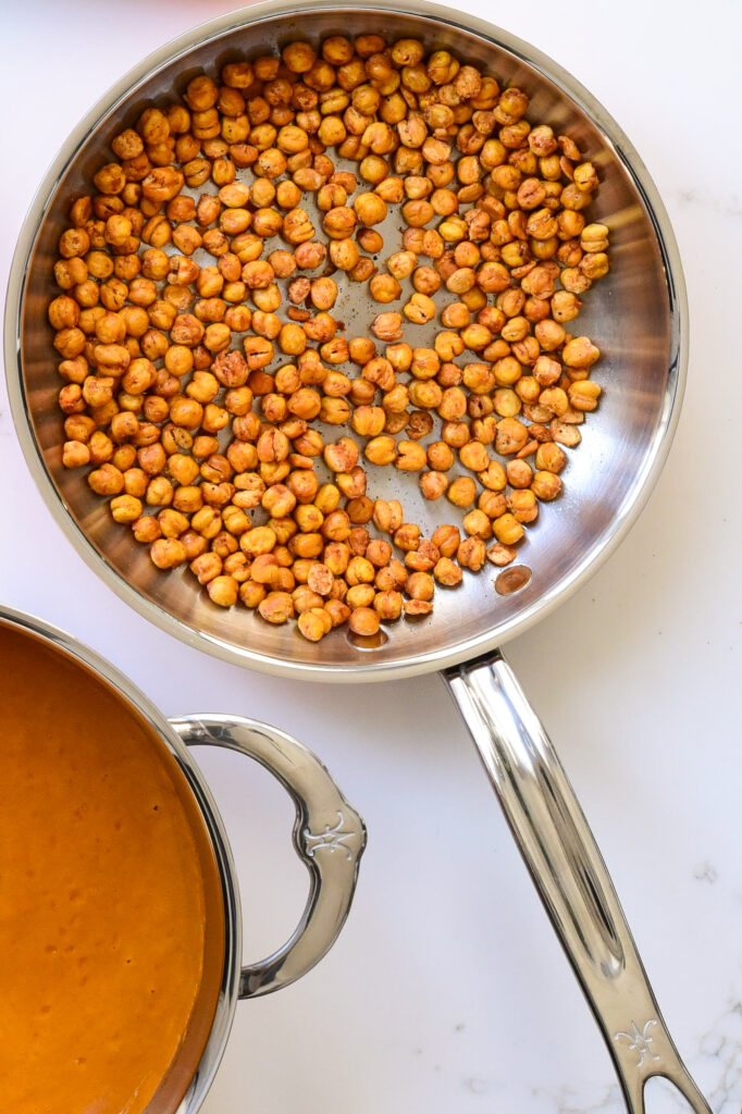 Crispy Chickpeas. Top down image of a skillet with chickpeas.