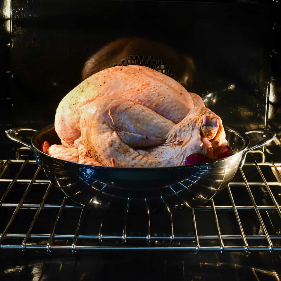 A dry rubbed turkey in wok (with a flat bottom) in the oven.