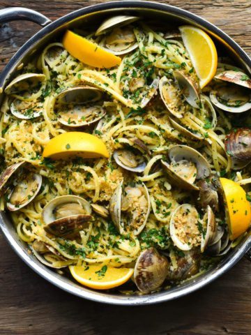 A finished pan of linguine and clams with lemons