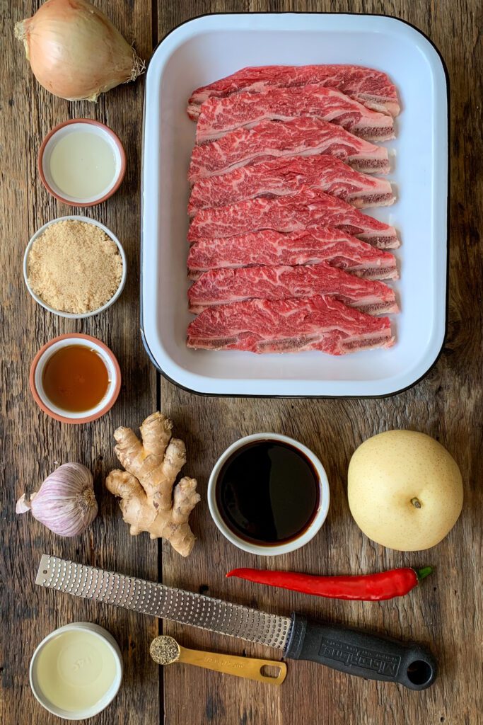 Ingredients laid out for BBQ beef Korean short ribs.