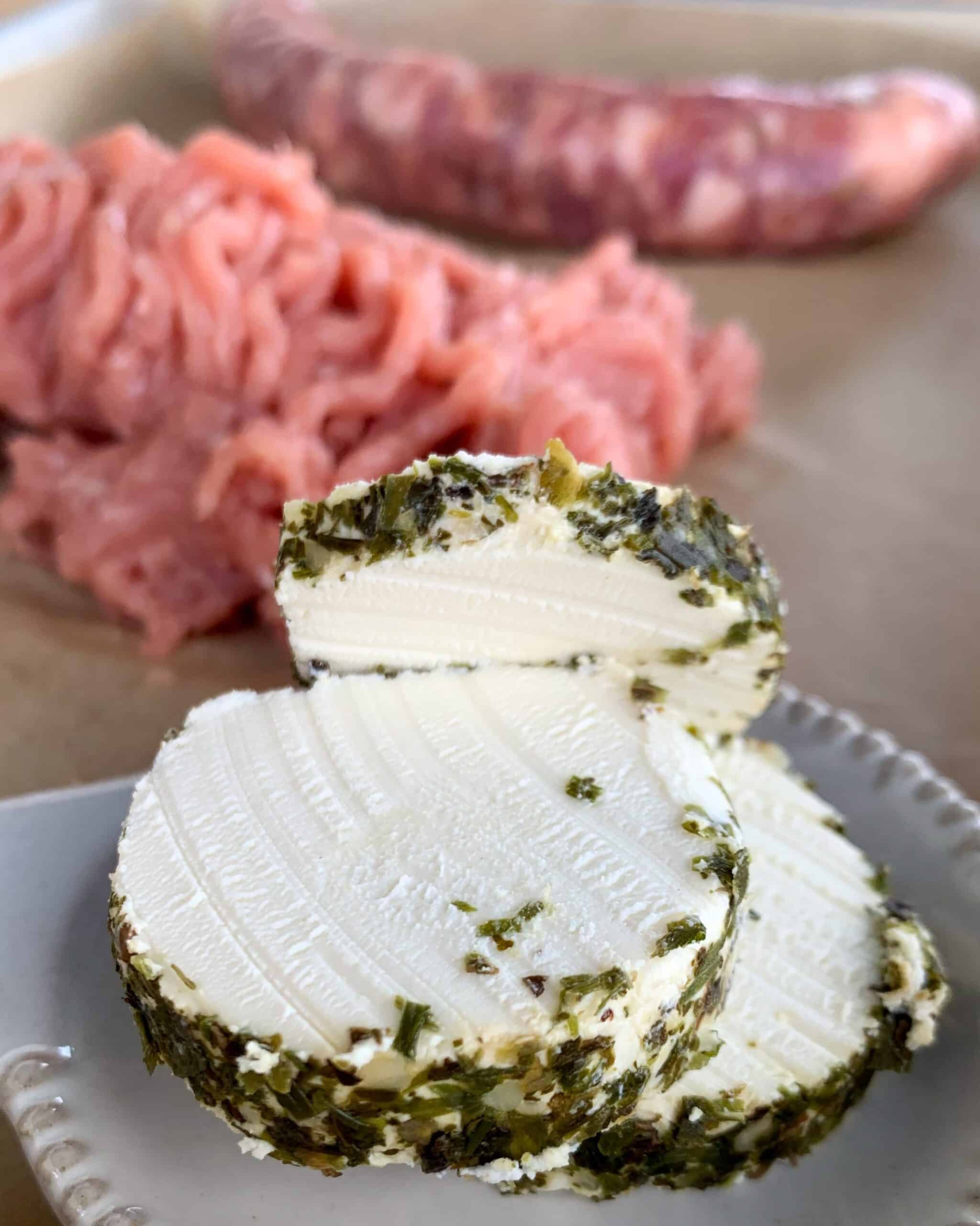 Sliced of herb crusted goat cheese