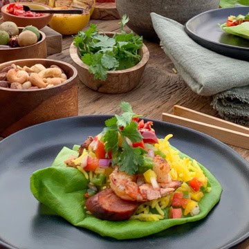 A shrimp, sausage and rice lettuce wrap.