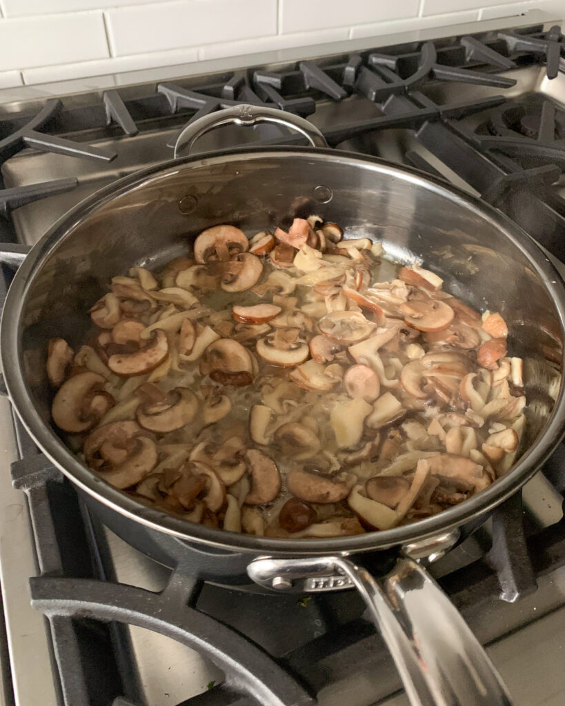 Cook the mushrooms and add flour.