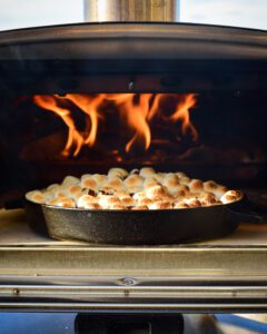 A sweet potato casserole in the flaming wood oven