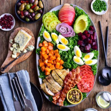 A top down image of a colourful winter cobb salad