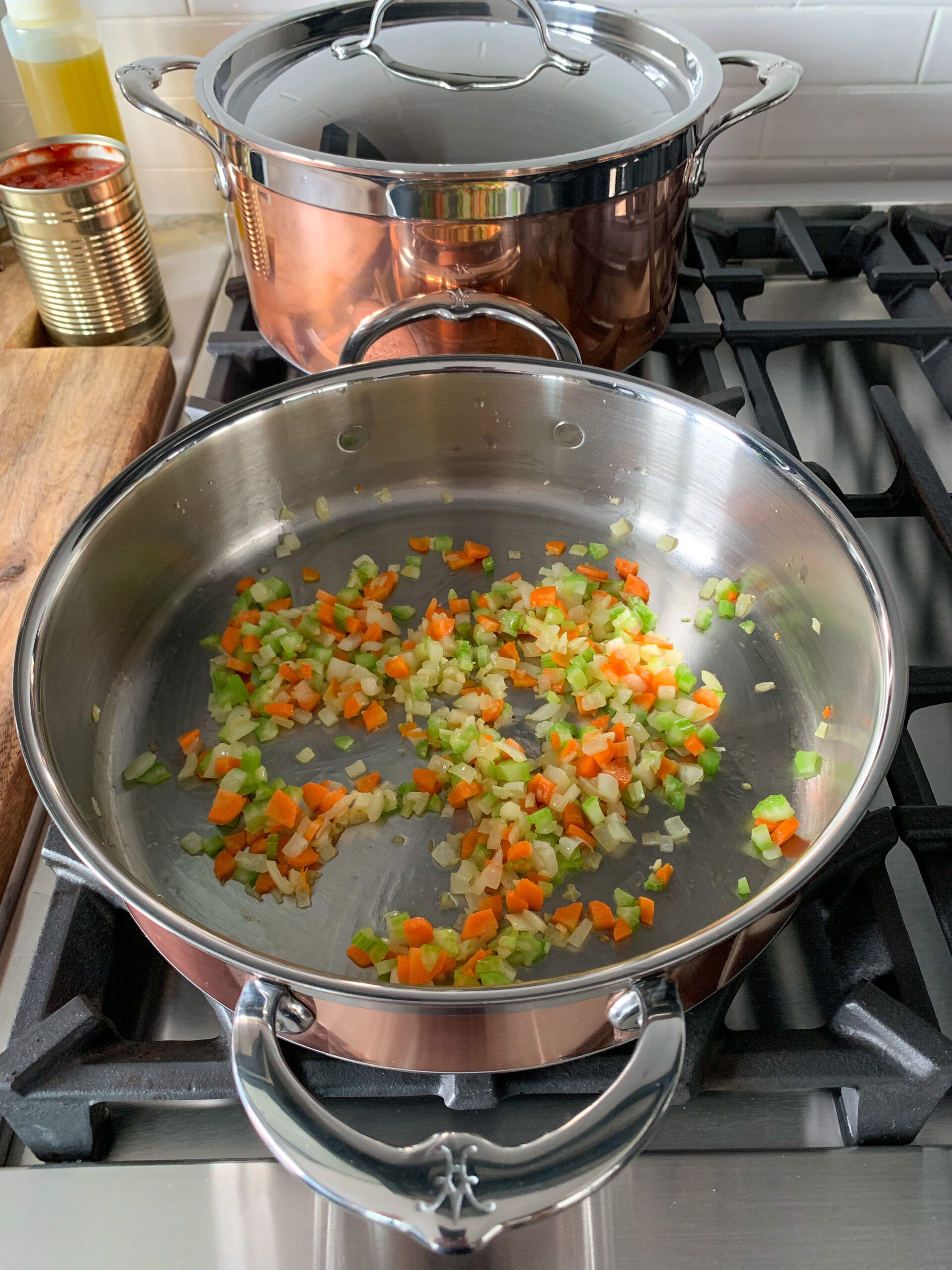 Sauté onions, garlic, carrots and celery in a pan. 