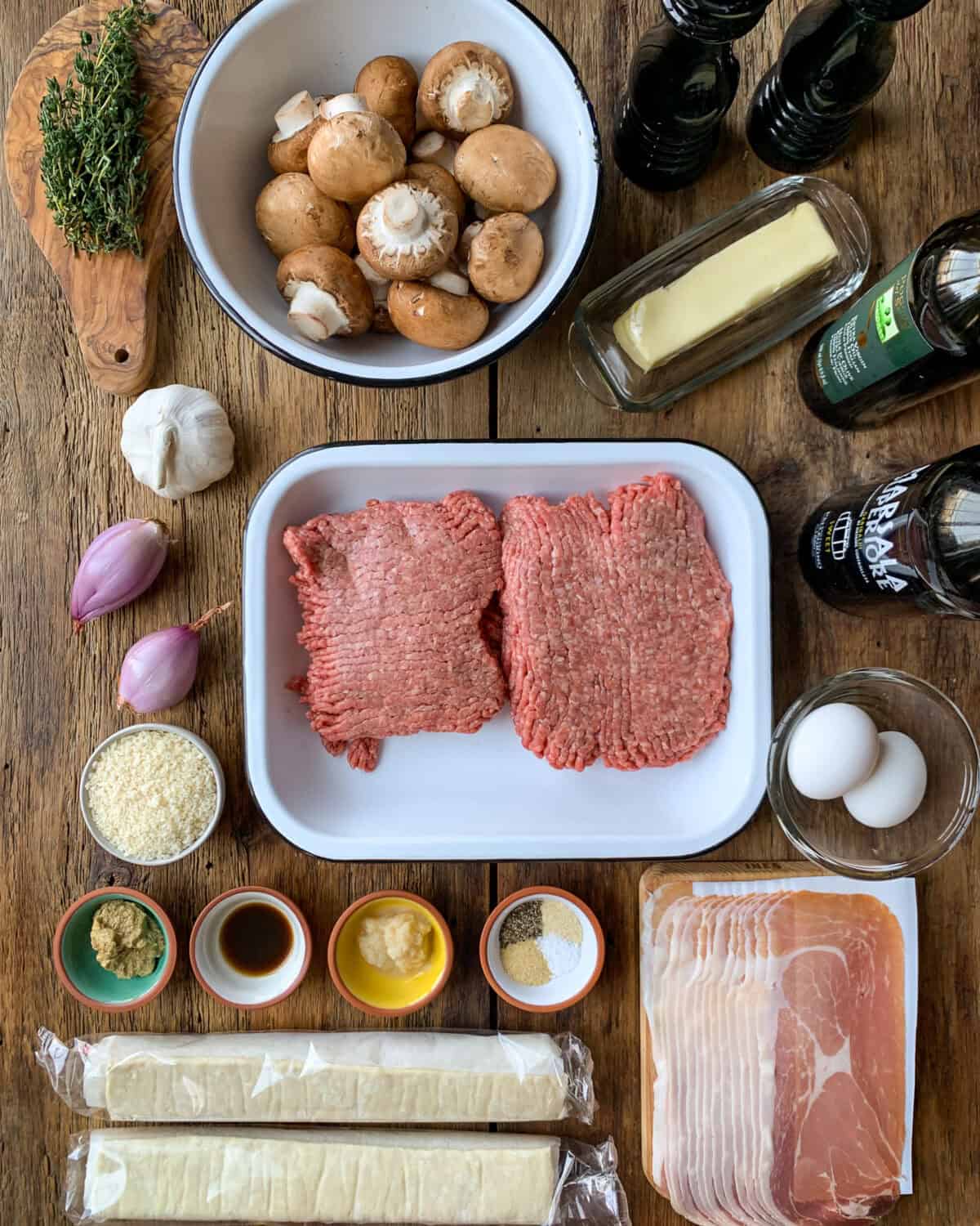 Ingredients laid our for a ground beef wellington recipe.