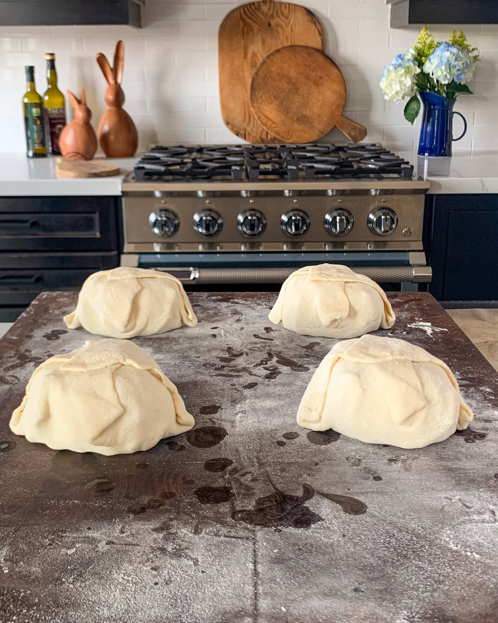 Place seam-side down onto the puff pastry and wrap it like a package, sealing the edges with a little water.