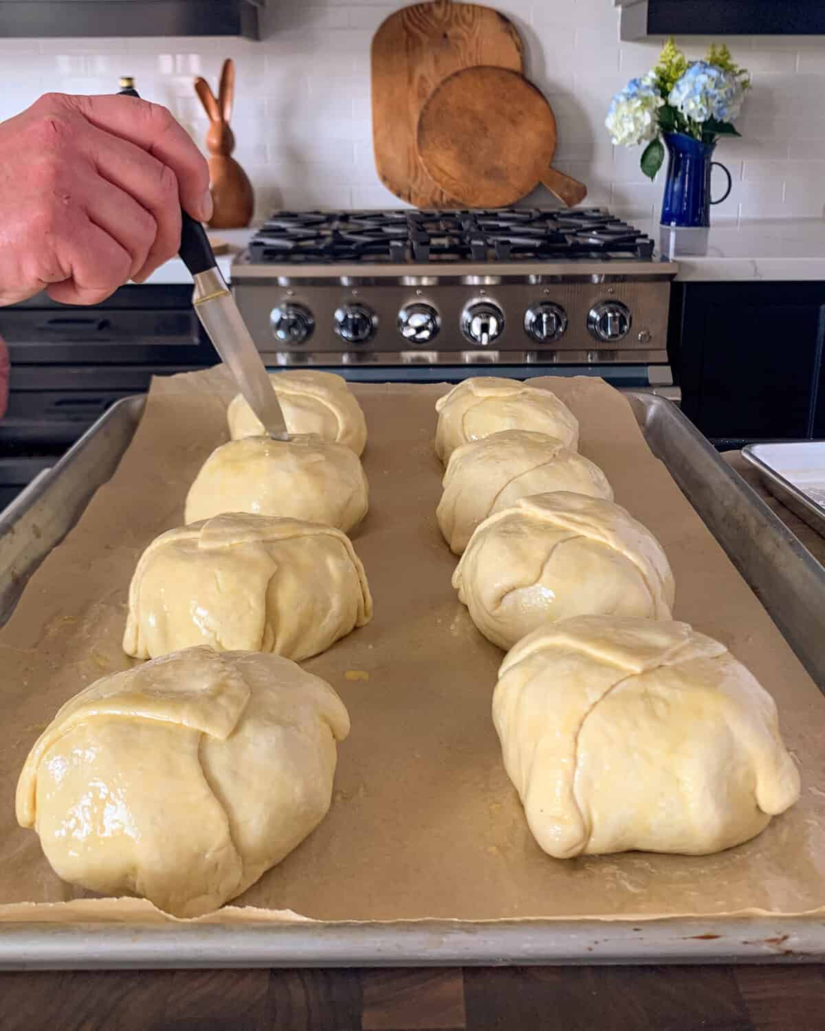 cut a small slit with a sharp knife in each for ventilation.