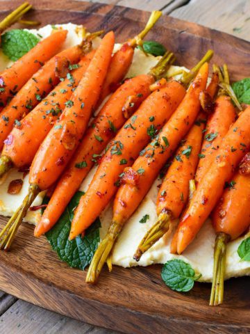 A platter of sous-vide carrots and hummus.