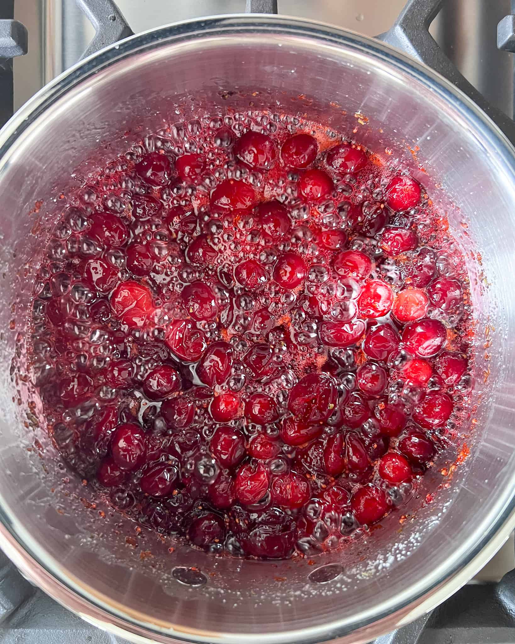 Reduce heat to medium and boil the cranberries gently for 7-8 minutes, stirring occasionally until cranberries have softened.