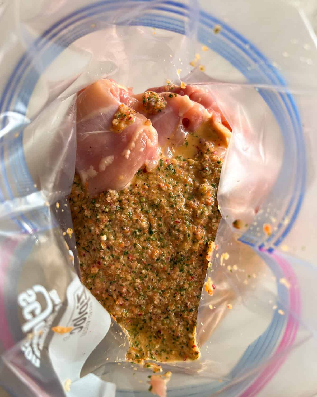In a resealable bag, combine the rest of the sauce and the boneless skinless chicken thighs and marinate for 1-4 hours.
