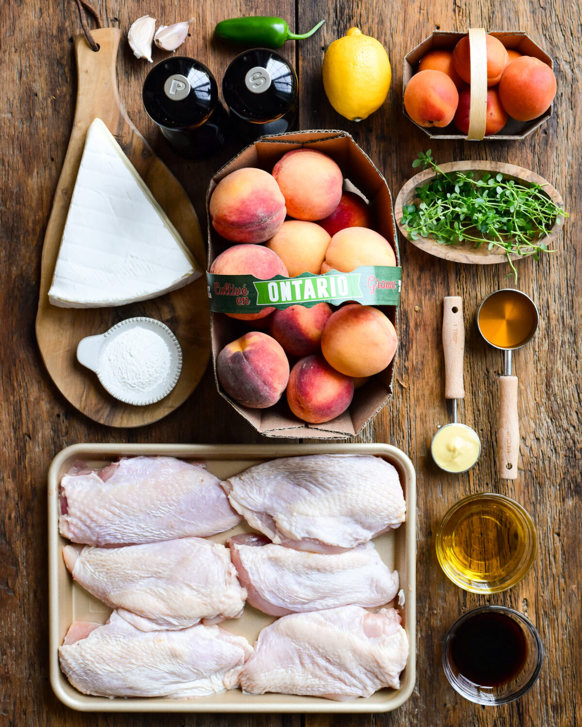 Ingredients for grilled chicken breasts with peach glaze.