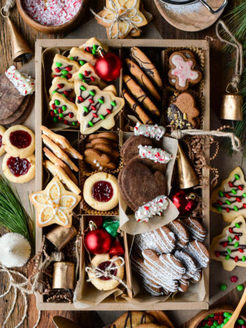 A Christmas Cookie box with a variety of cookies including basic sugar cookies, three ways.