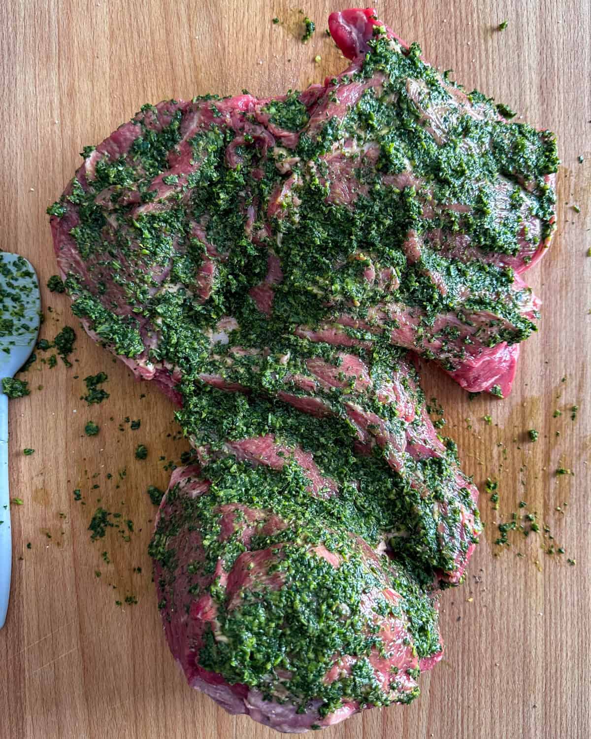 Rub the sauce over the inside of the lamb.