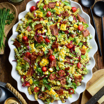 A large platter with a BLT pasta salad with a Buttermilk-herb dressing.