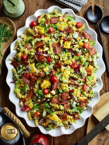 A large platter with a BLT pasta salad with a Buttermilk-herb dressing.