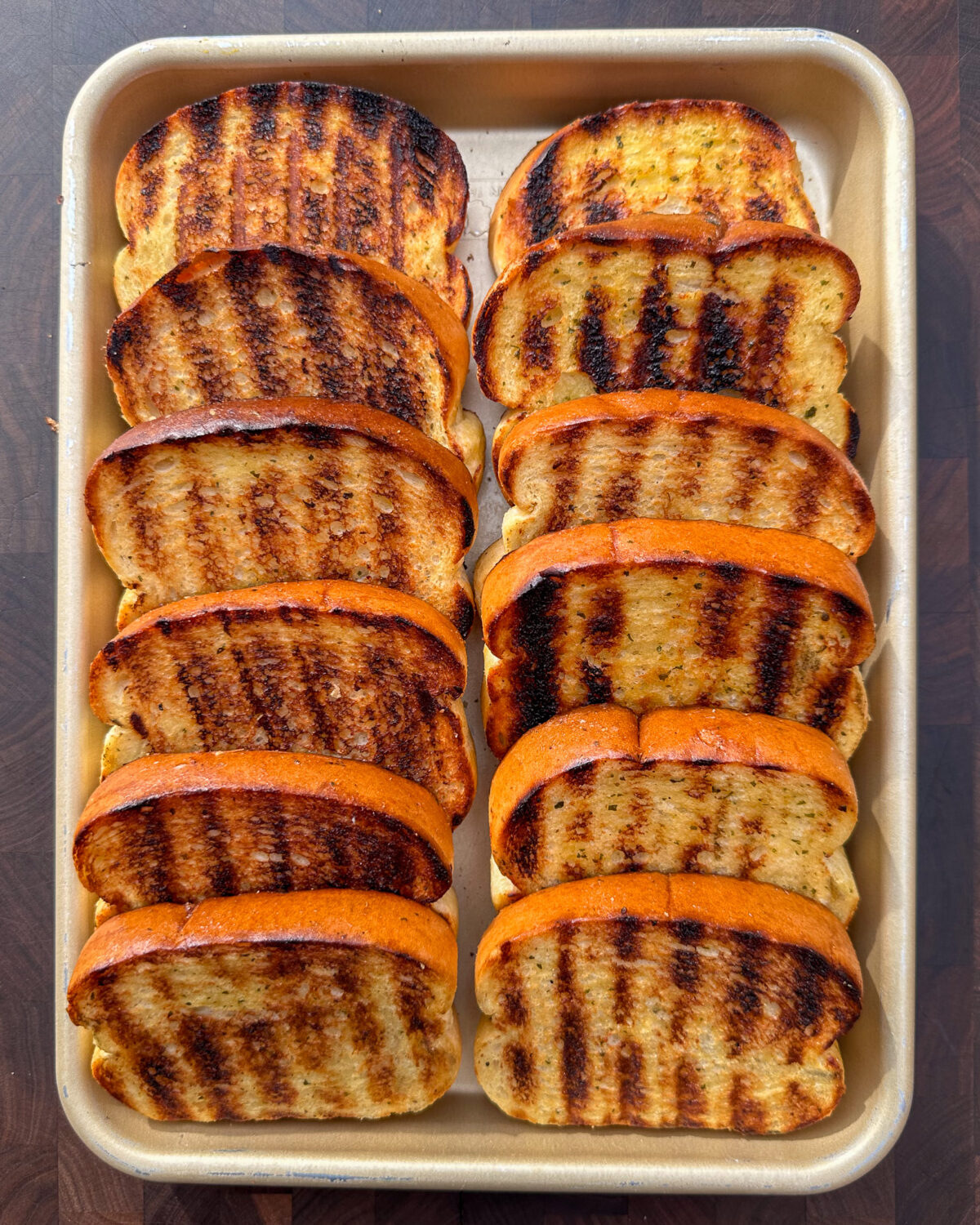 Place the Texas toast on the hot grill and grill each side for 15 to 30 seconds, until golden brown.