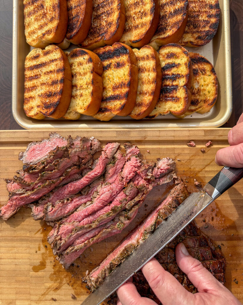 Slice the flank steak against the grain.