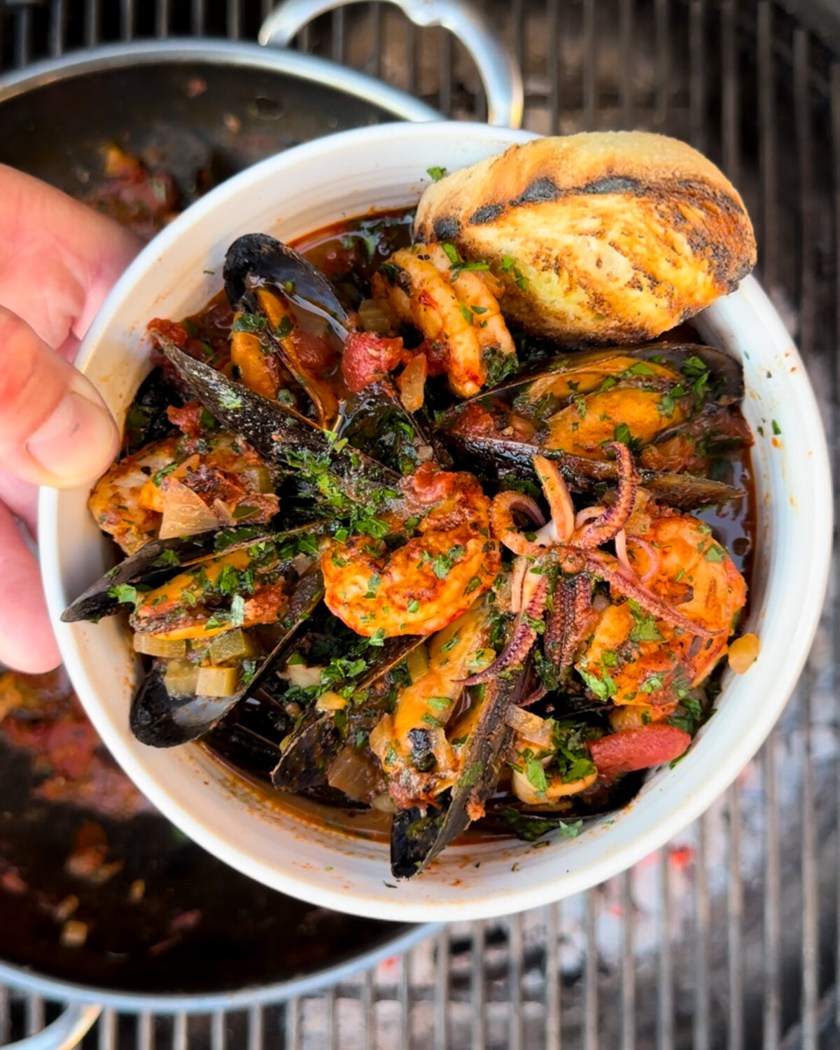 Serve mussels with grilled bread for dipping.