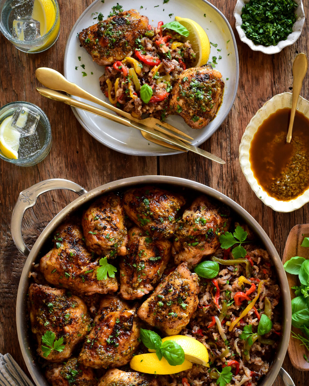 A large pot of Piri-Piri Chicken thighs with Spicy Rice along with a plated portion.