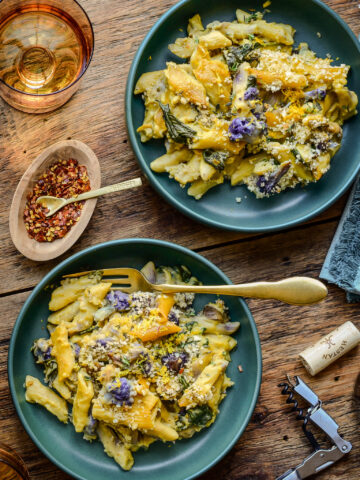 Two bowls of a vegan cauliflower pasta bake.