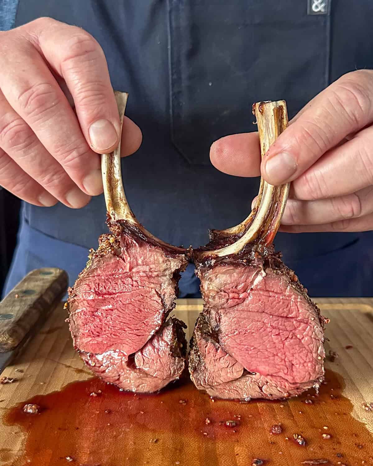 A medium-rare grilled venison rack cut open.