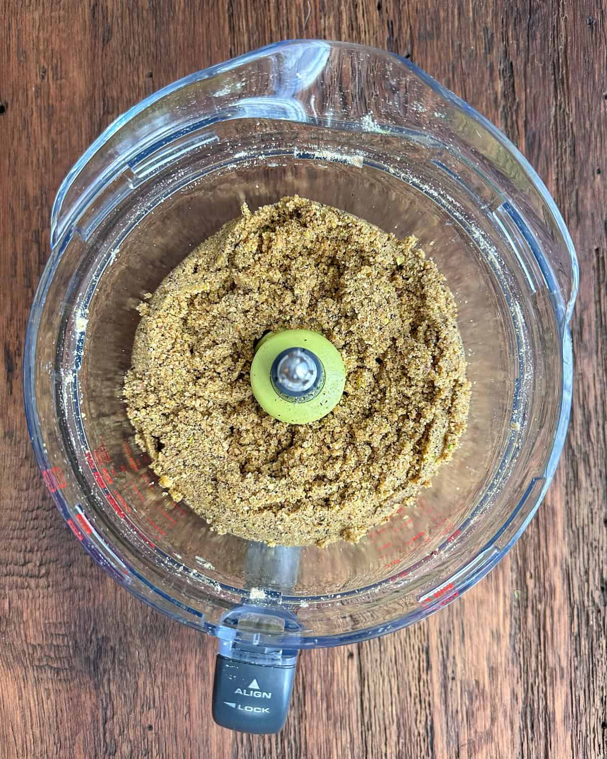 In a food processor or medium bowl, mix graham cracker crumbs, ground pistachios, sugar, cardamom, and finely ground Earl Grey tea.