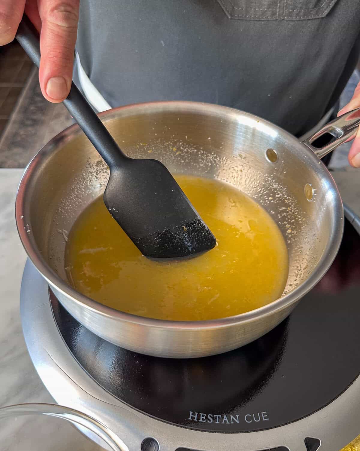 Add lemon juice and stir until the sugar dissolves.