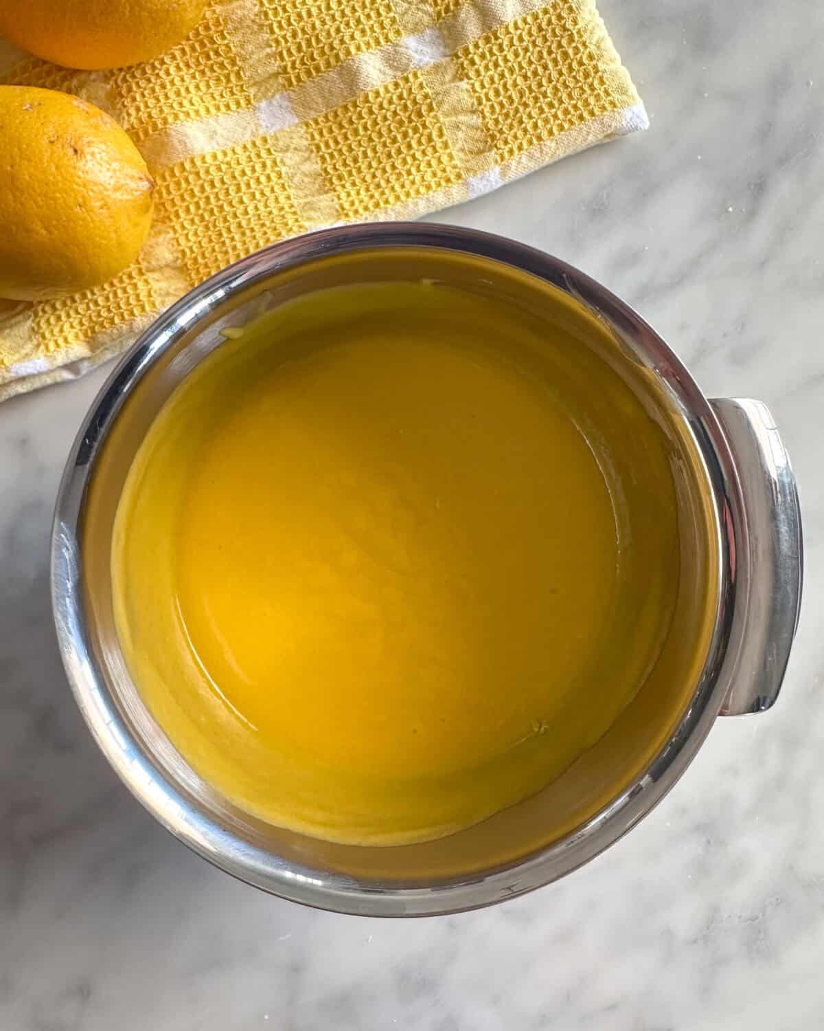 Whisk the lemon pie curd until smooth, then let cool to room temperature.