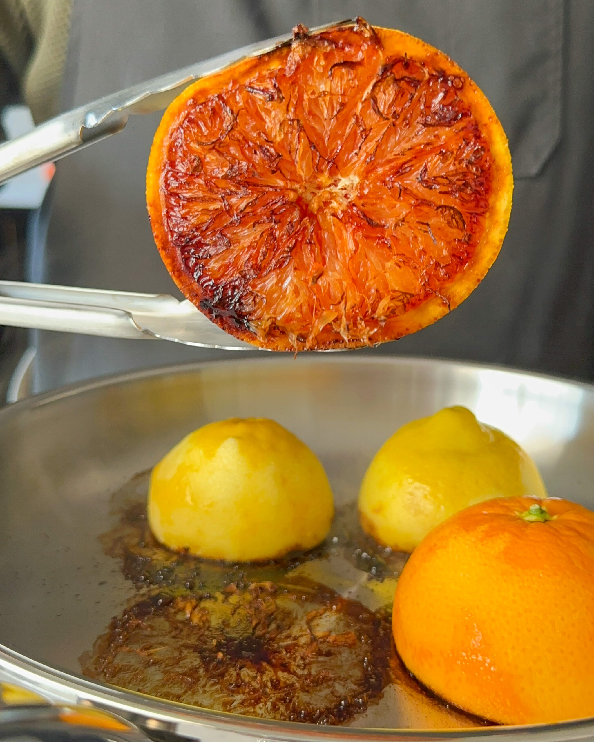 Cut the citrus in half and place the cut side down in the hot pan. Press gently and let cook undisturbed for 3–5 minutes until carmalized.