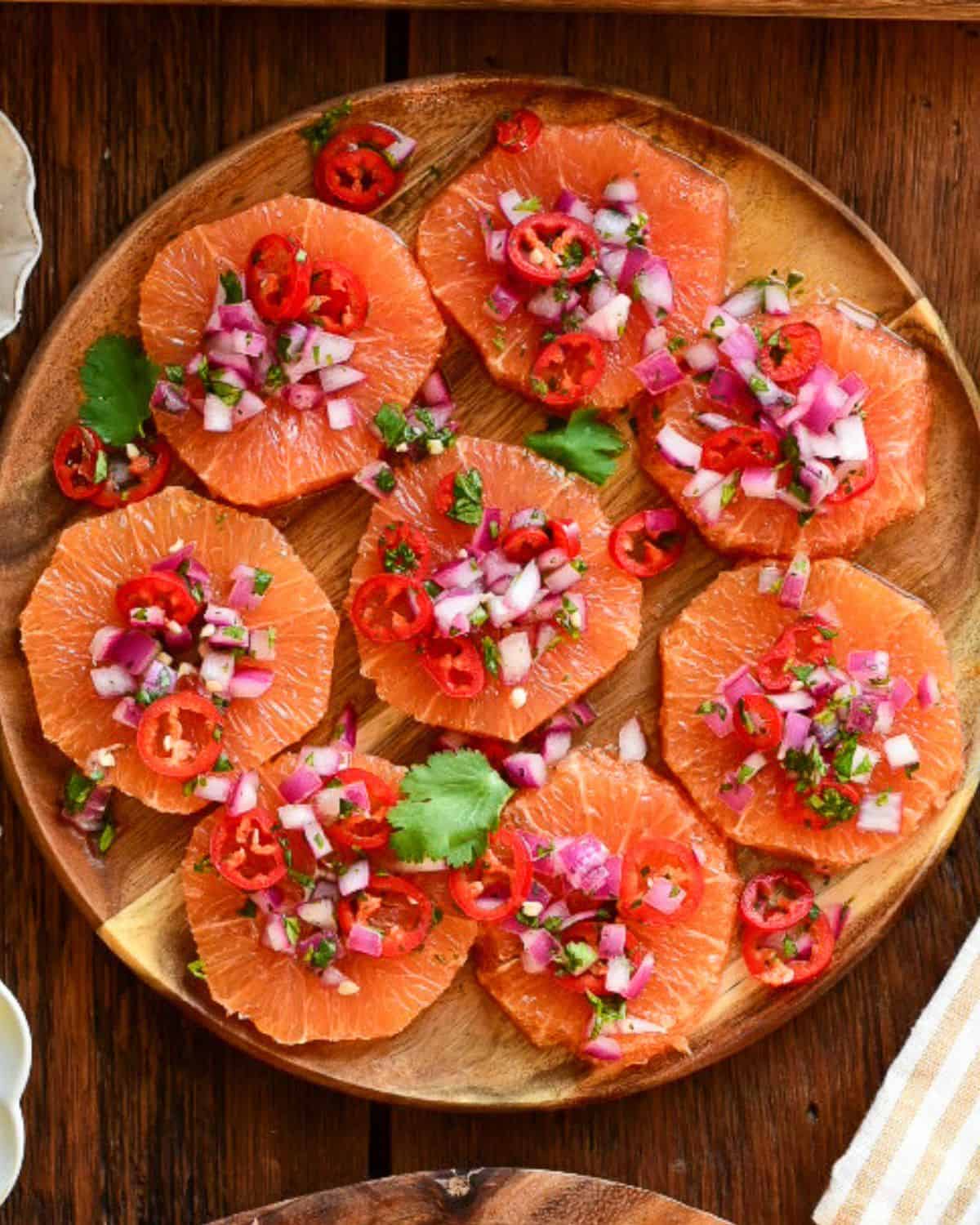 A plate with an orange salsa.