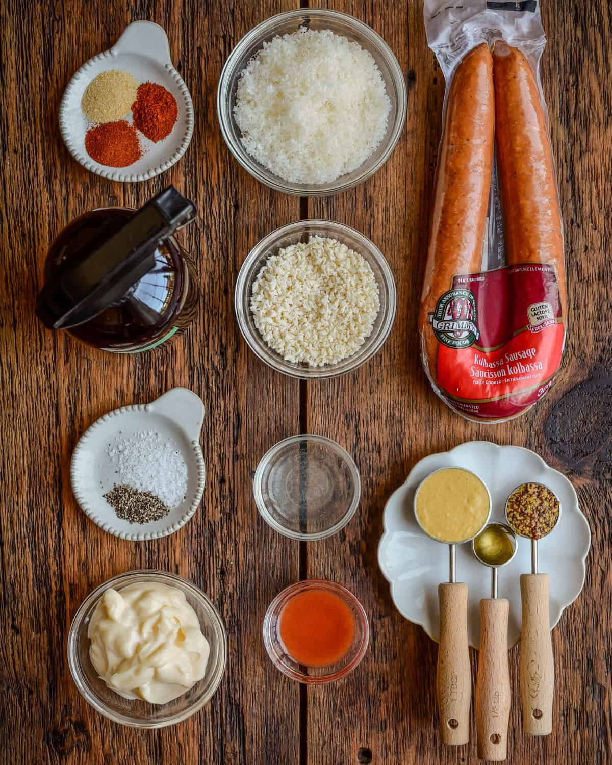 Ingredients for a kielbasa air fryer recipe with a spicy mustard aioli.