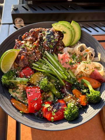 A Beef and Broccoli Noodle Bowl on the Griddle with all the fixings.
