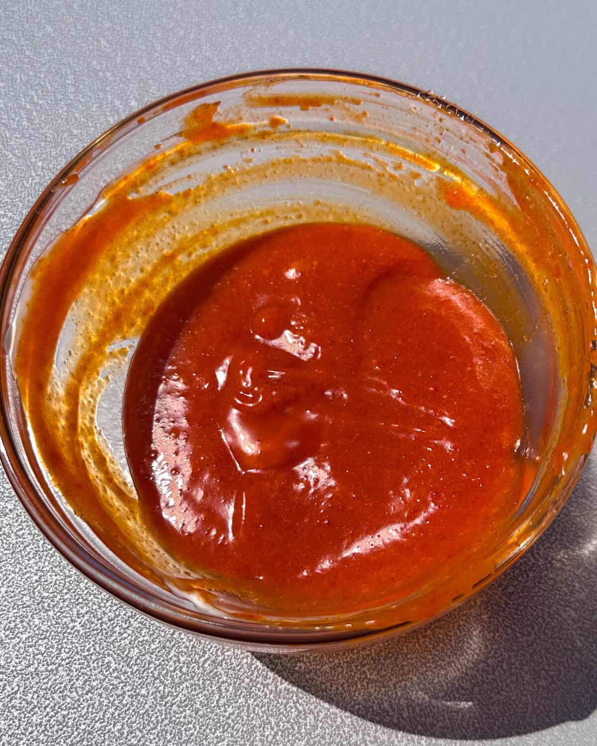 A small bowl of Gochujang Mayo.