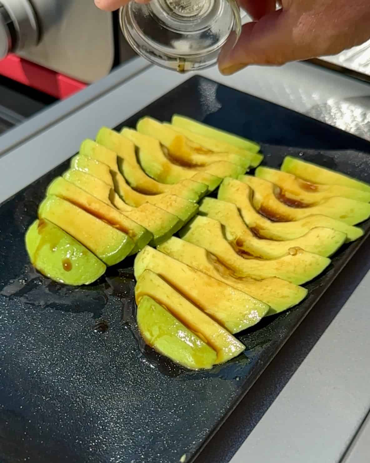 Marinated Korean Mayak avocado slices.
