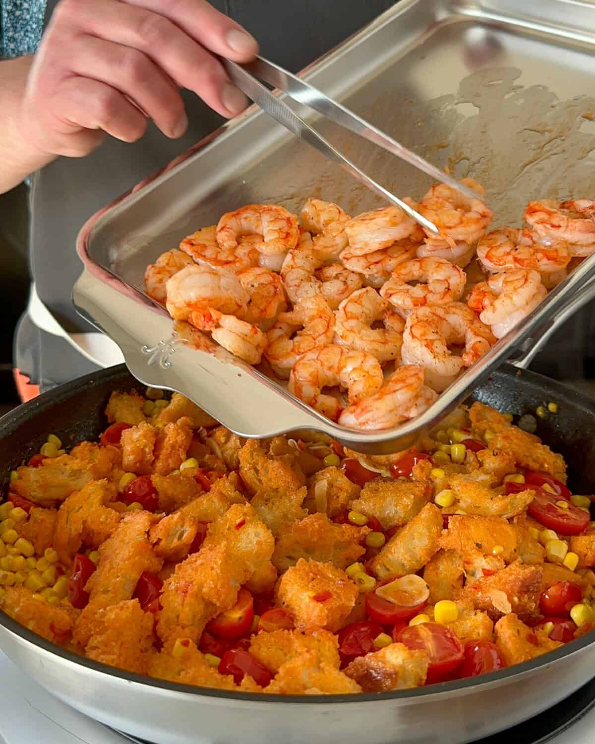 Return the cooked shrimp to the skillet,