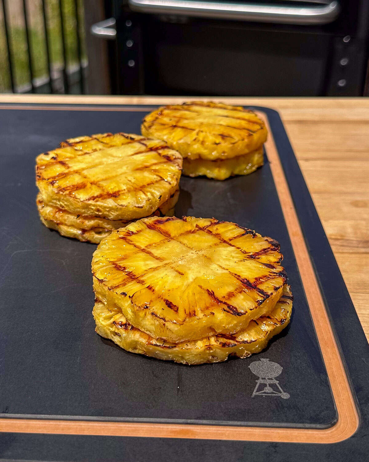 Three stacks of grilled pineapple for a pineapple relish.