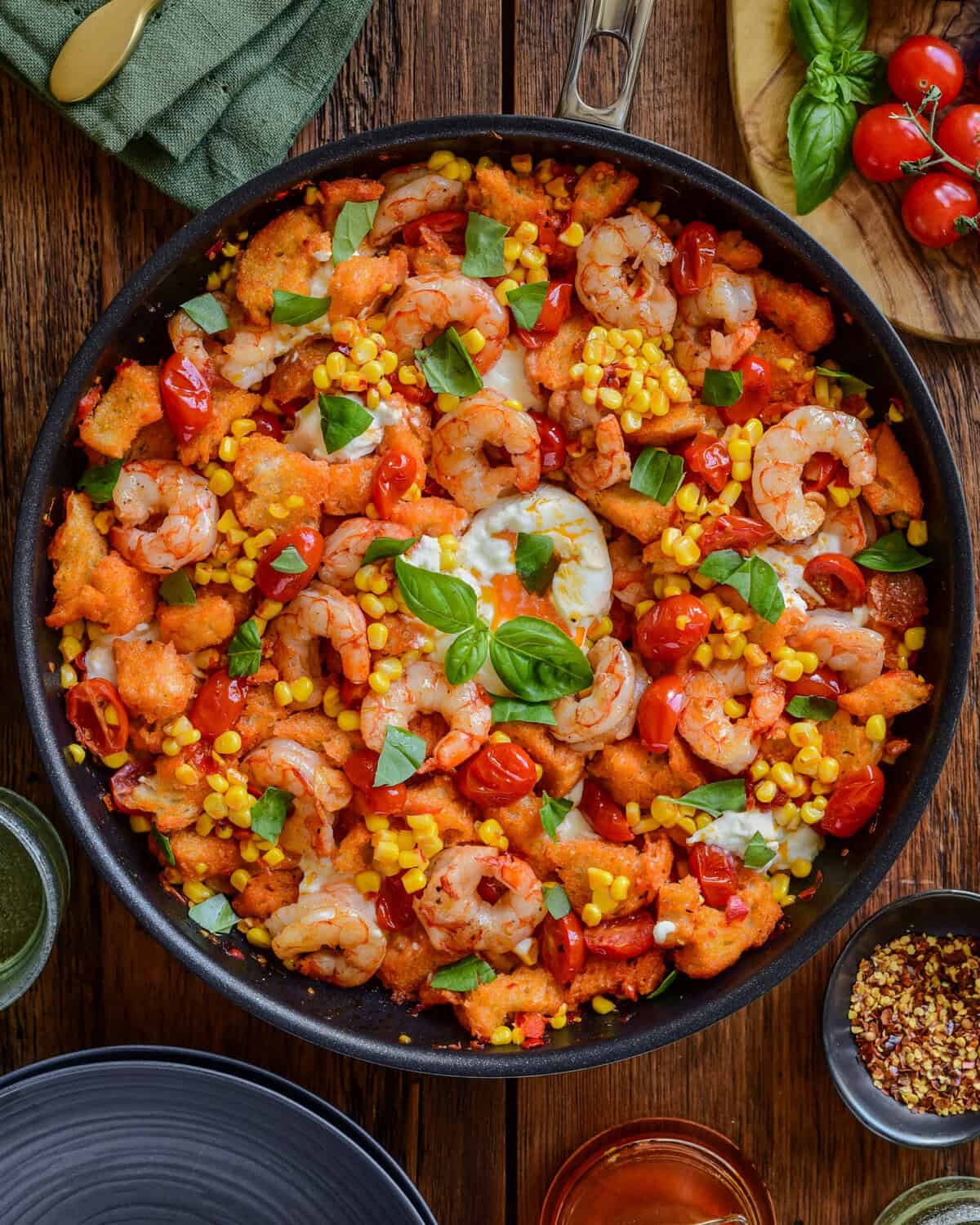 A one-skillet pan of a spicy shrimp panzanella skillet.