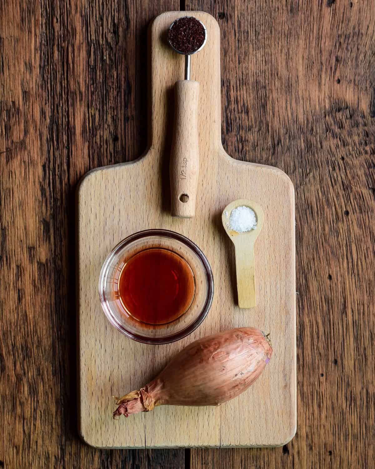 Ingredients for a pickled shallots recipe.