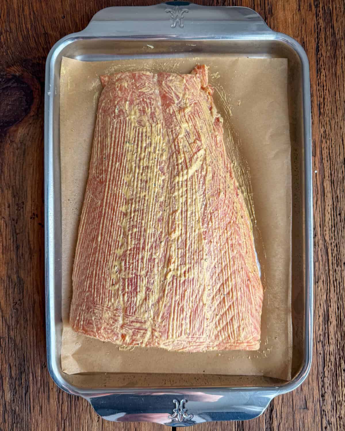 Prep the salmon with a layer of mustard.