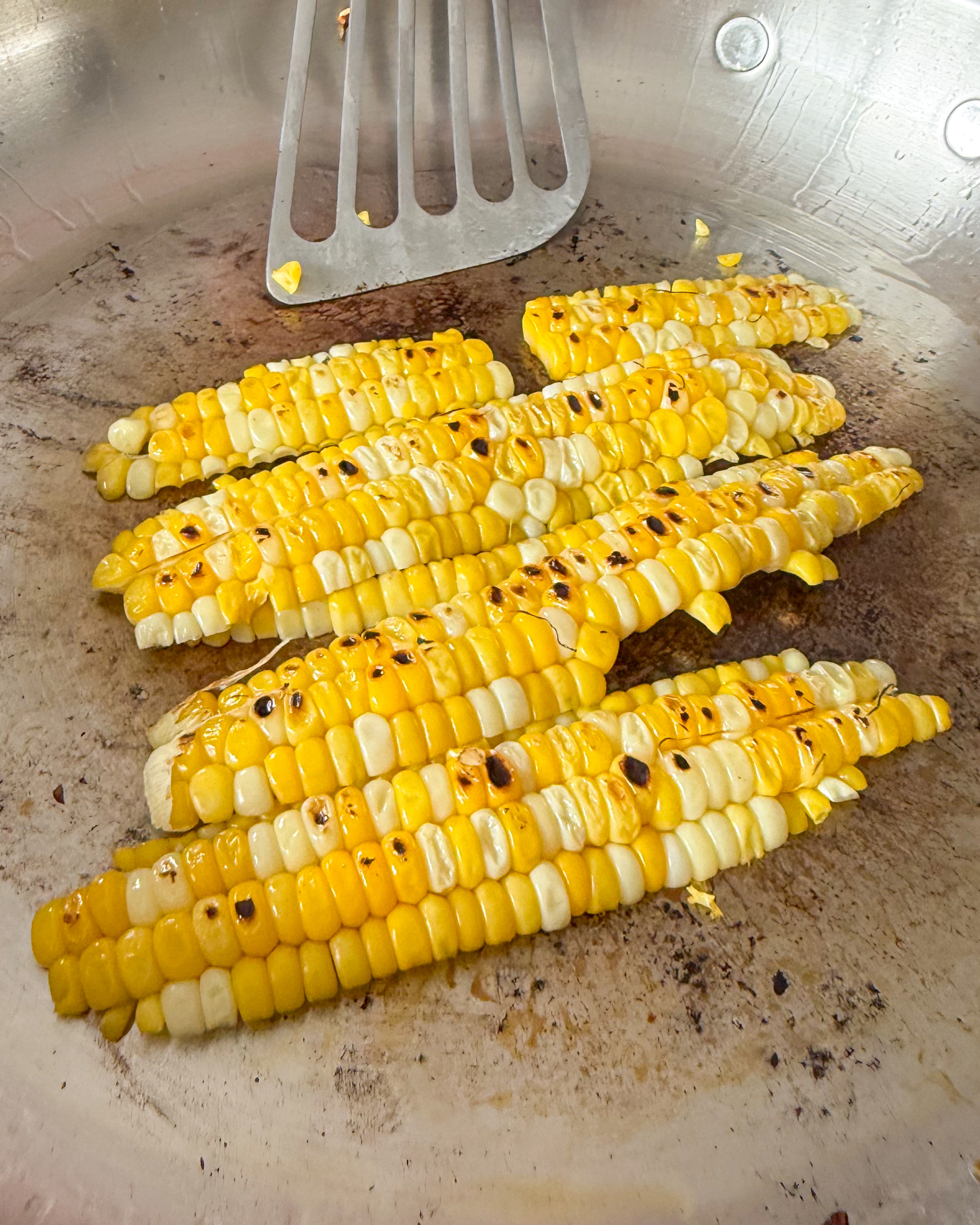 Seared corn for a charred corn salad recipe.