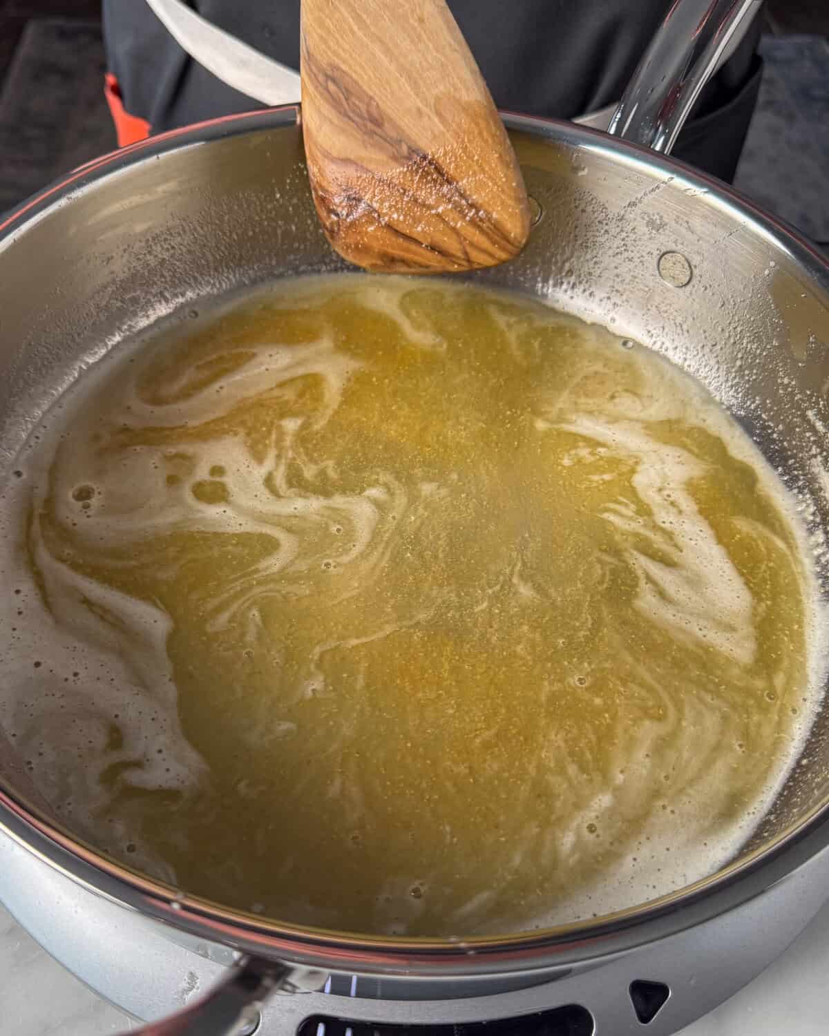 Cooking brown butter for a potato salad.