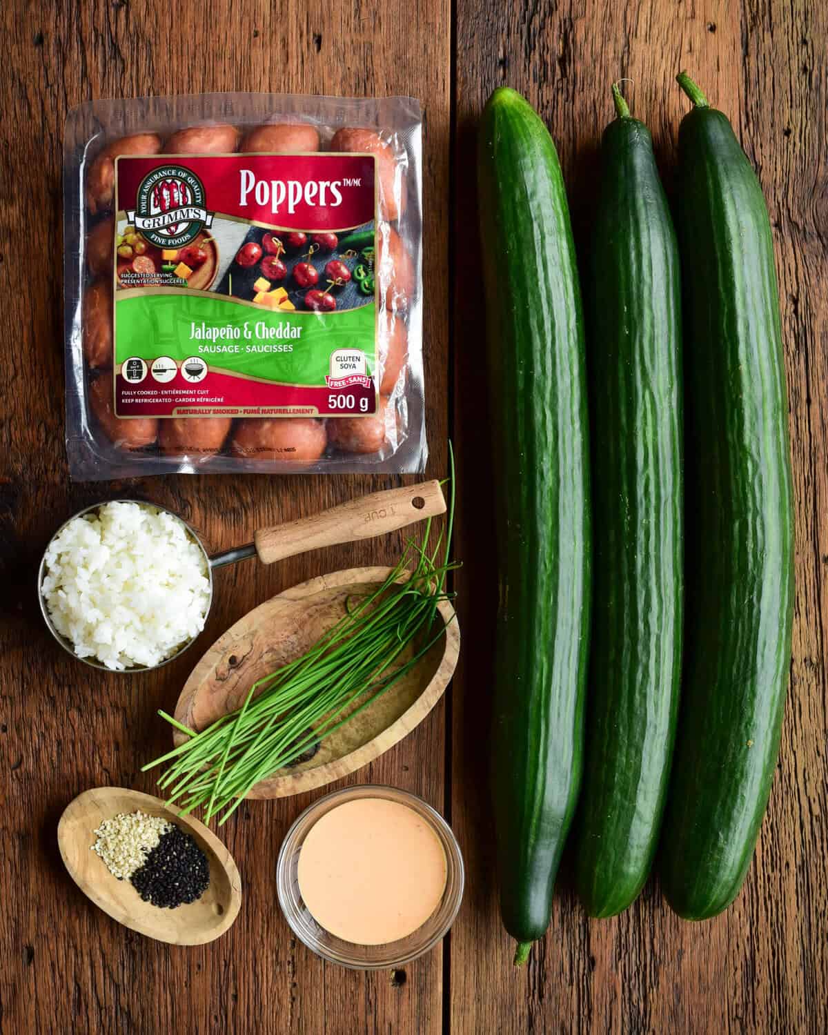 Ingredients laid out for a cucumber cups recipe.