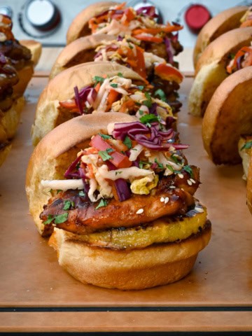 Chicken Teriyaki Sliders with Pickled Asian Slaw and grilled pineapple.