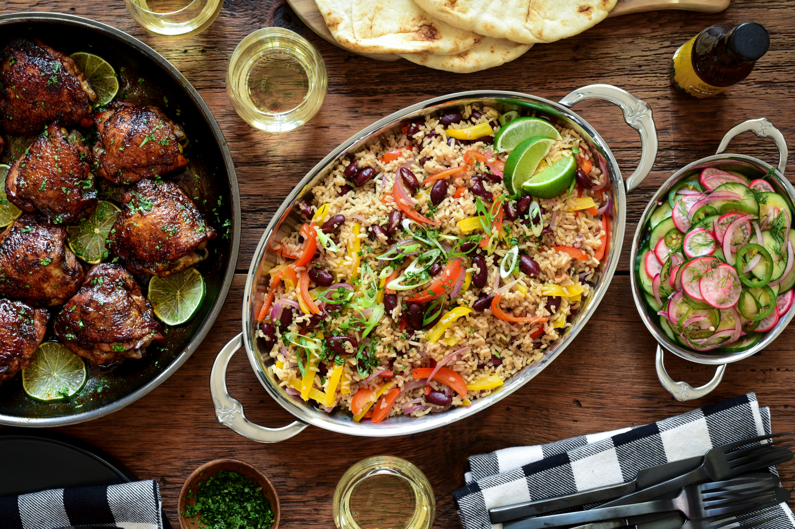 Caribbean-Style Rice with Red Beans and Peppers served with Sticky Rum Glazed Chicken Thighs and a Cucumber and Radish Salad.