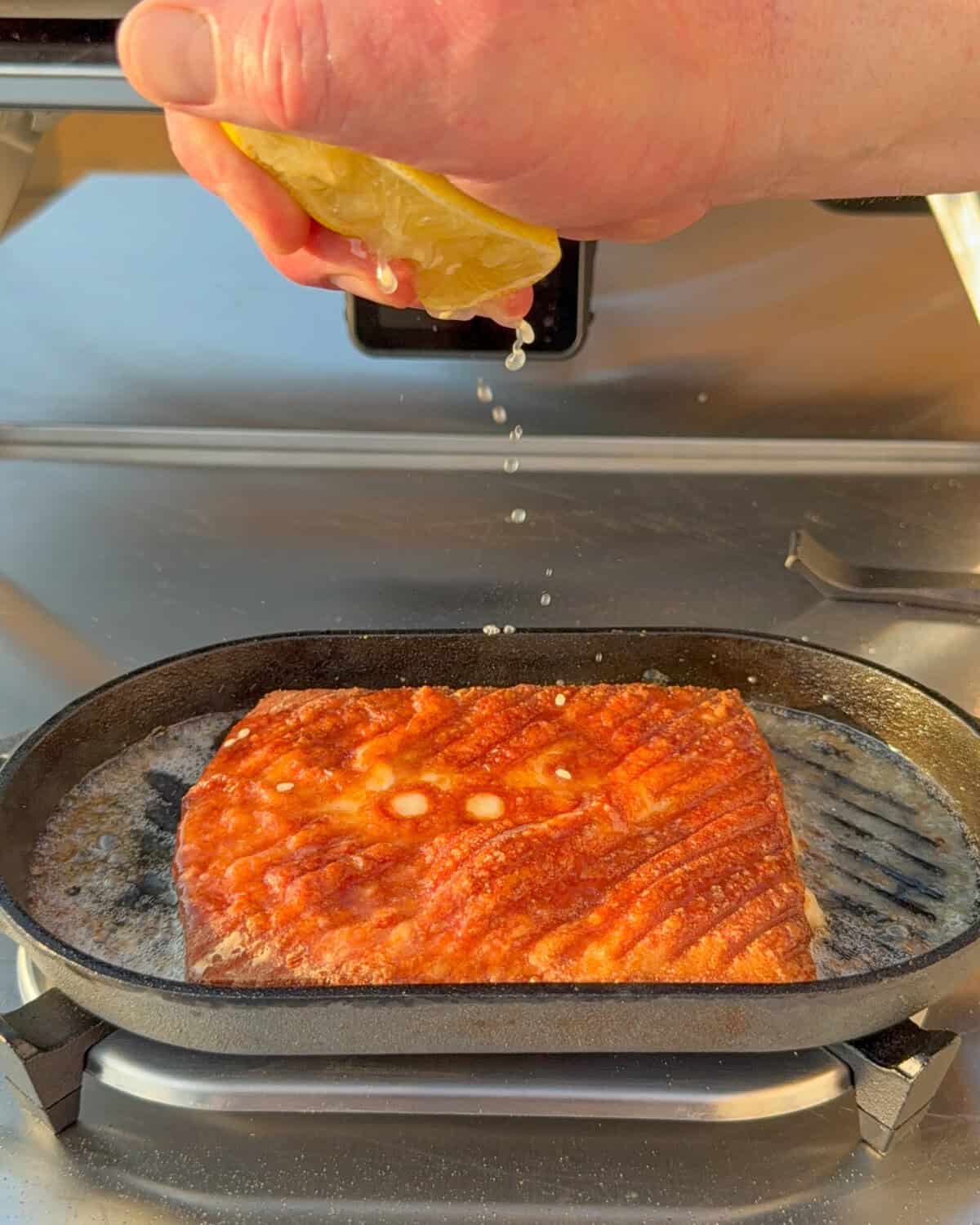 Squeeze the lemon juice over the flame to extinguish.